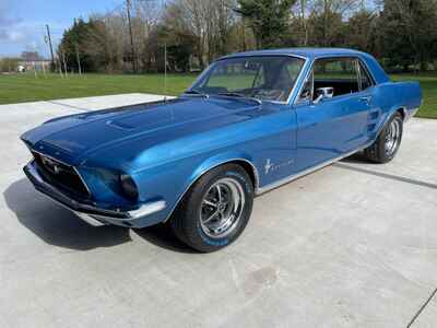 1967 Mustang Acapulco blue coupe, V8 and Manual four speed transmission
