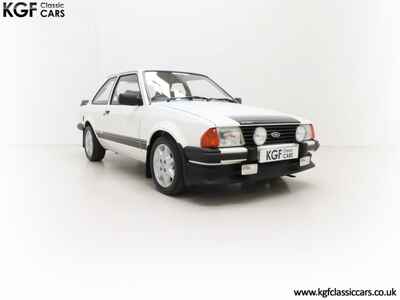 A Sensational Diamond White Ford Escort RS1600i with Only 22, 963 Miles.